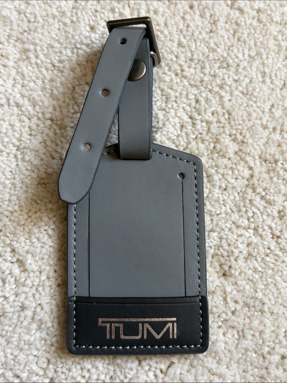 Tumi Gray and Black Leather Luggage Tag with Silver Logo
